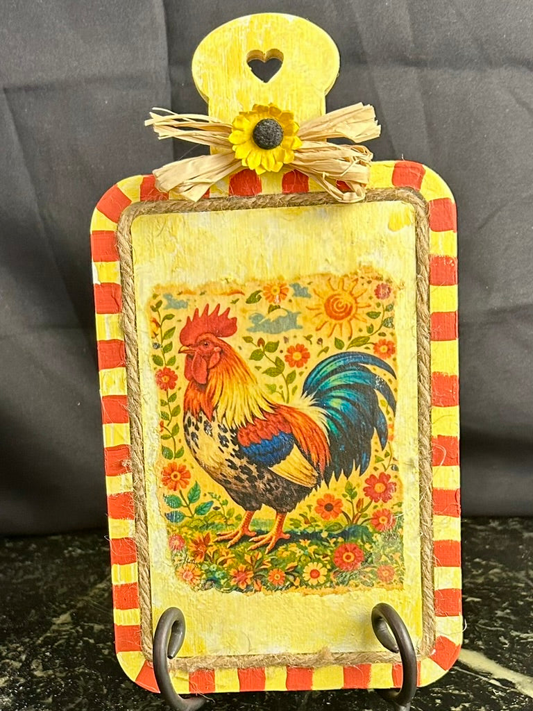 Folk art roster on checked mini cutting board